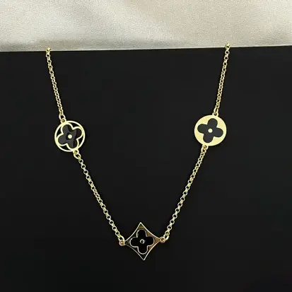 CHOCKER DOURADO 3 TREVOS DIVERSOS PRETO 35+5CM